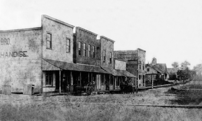 Before the conflagration - the close-packed wooden stores built along South Washington Ave. in the 1870s and 1880s.