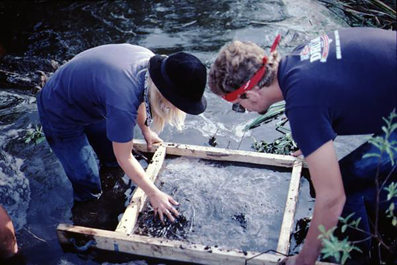 FSU Archaeologists screening the mud from the Windover pond bottom for artifacts or other archaeological remains.